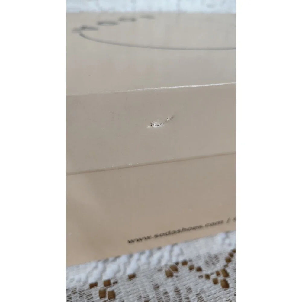 Empty shoe box from Soda with Styrofoam Shoe Inserts